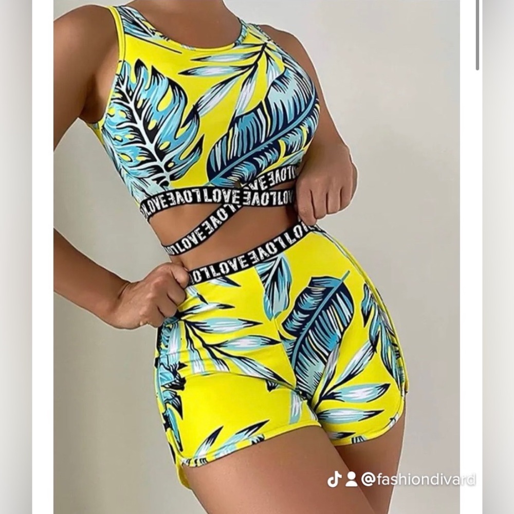 2 piece fashion tropical print cross body swimsuit.